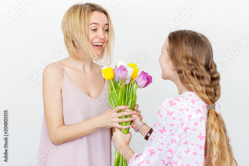 Daughter give mom flowers
