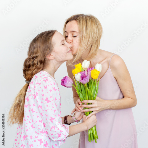 Daughter give mom flowers