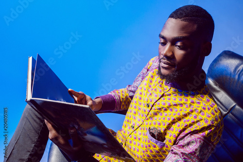 An African American is read...
