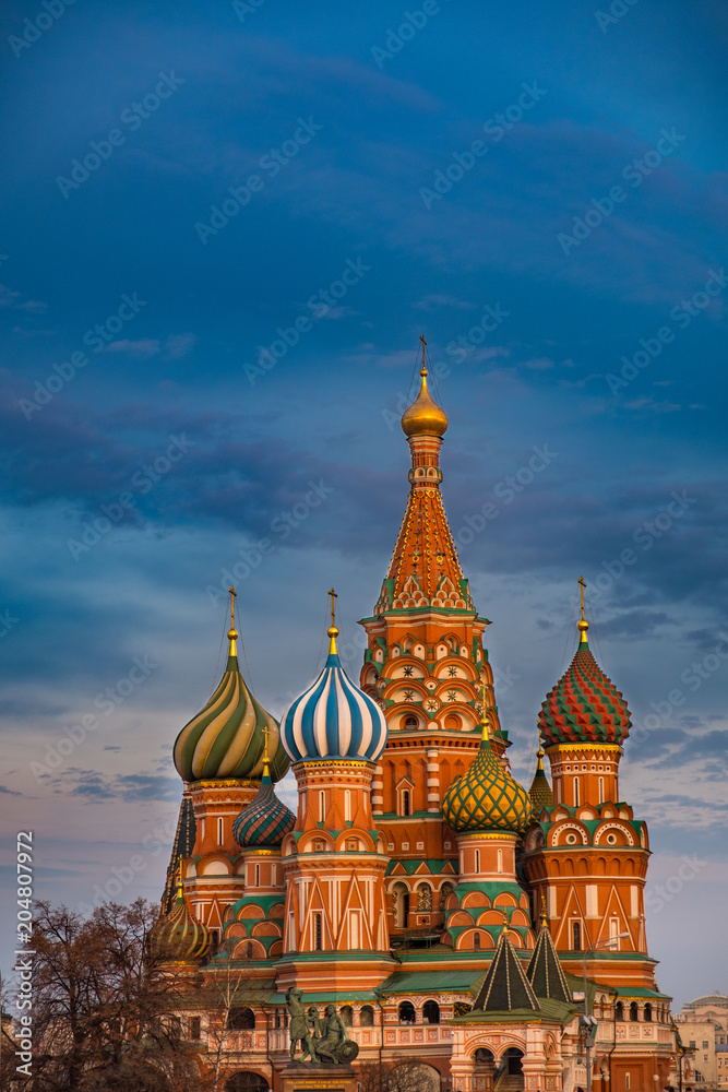 Saint Basil's Cathedral on Red Square, Moscow, Russia at sunset with dark colorful sky above