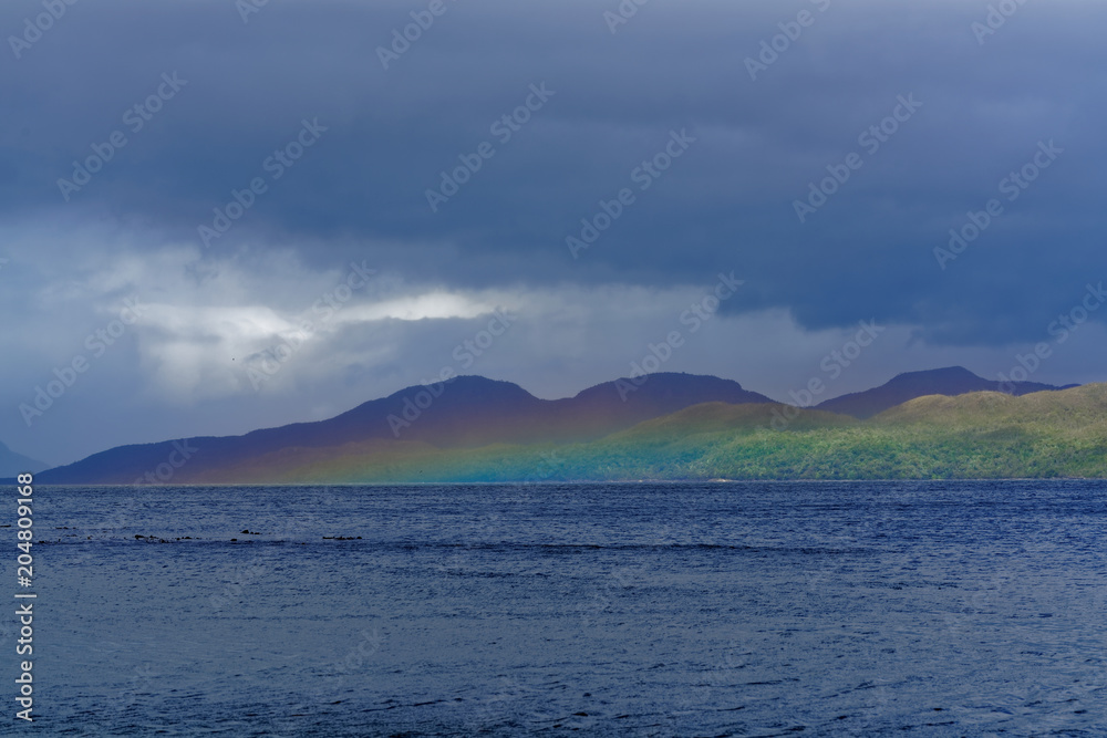 Patagonian landscape with a rainbow background product of moisture in the air
