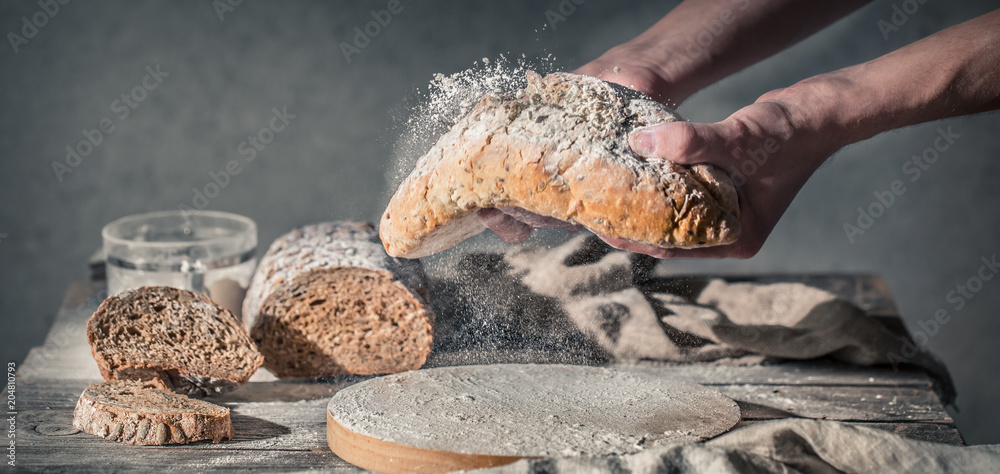 Fototapeta premium baker with flour in hand