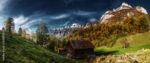 Churfirsten and Autumn Woods seen from Berschis © elliottcb