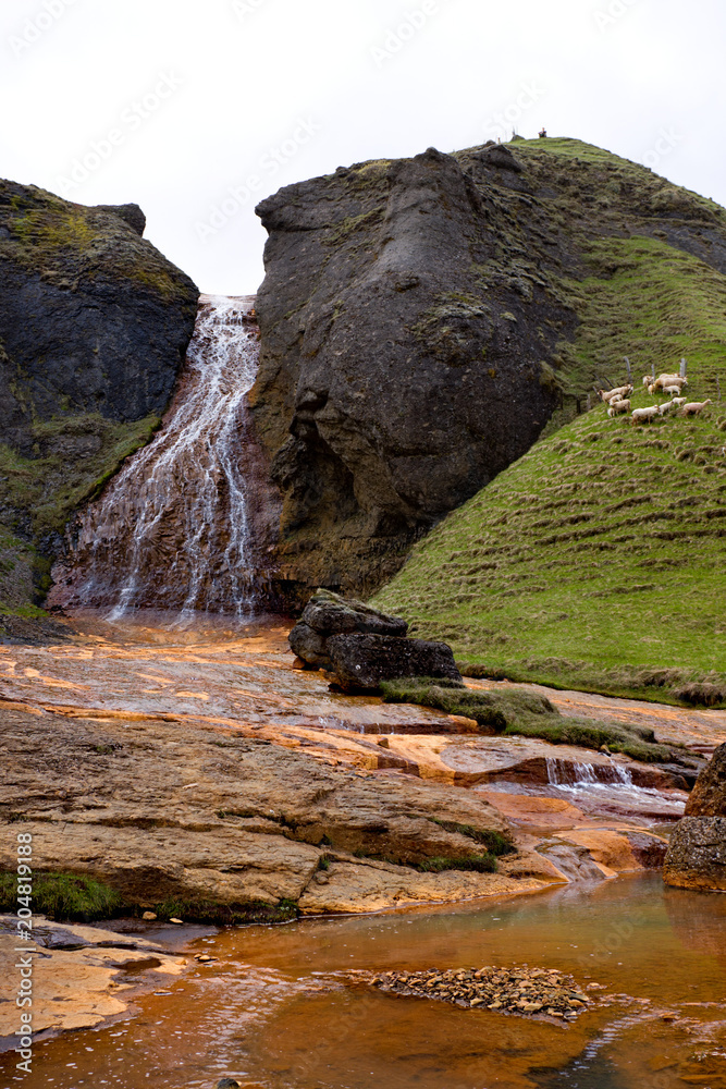 Red Waterfall Near Kirkjubaejarklaustur, Iceland