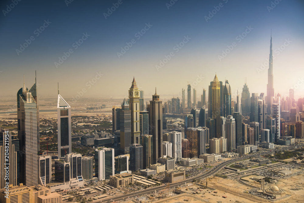 Dubai skyline from the air. Dubai downtown and modern skyscrapers.