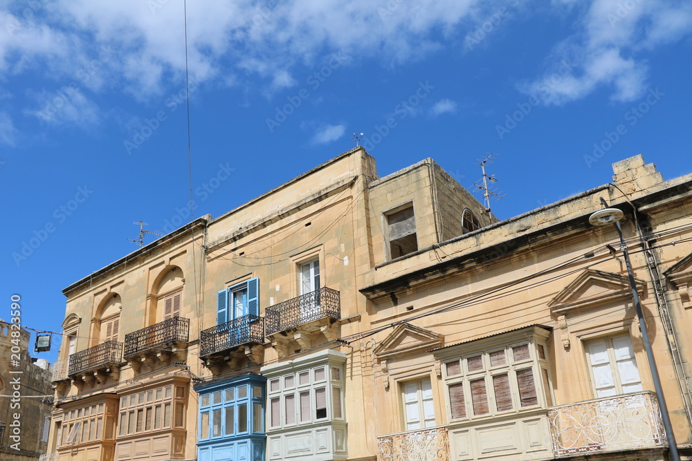 Typical balconies in Ir-Rabat in Gozo Island Malta at Mediterranean Sea 