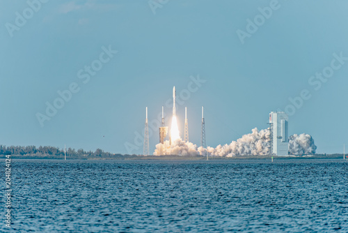 Fototapeta Naklejka Na Ścianę i Meble -  NASA rocket clearing the launchpad on liftoff