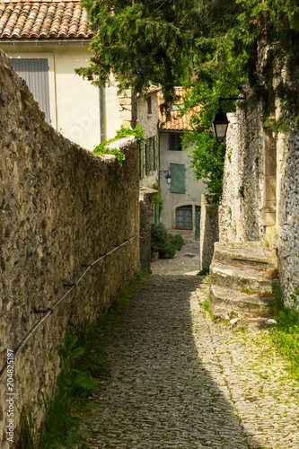 Typical paved french Provence street, Vaison-la-Romaine 2018.