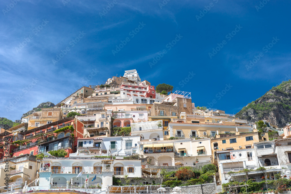 Positano Amalfi Coast Neaples Italy - Abstract view of colored houses and windy clouds.