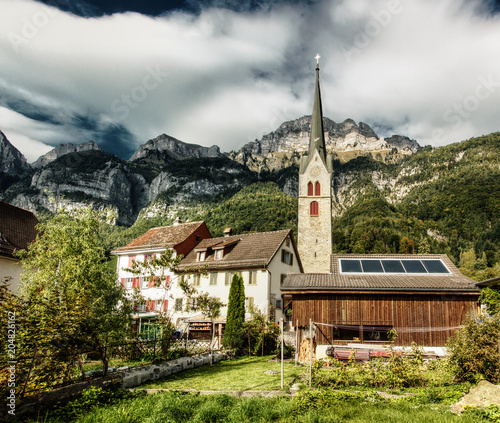 Catholic Church in Walenstadt, with Churfirsten as backdrop