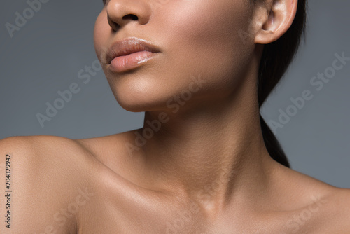 Freshness concept. Close up of female appearance and neck. Her skin is groomed and young