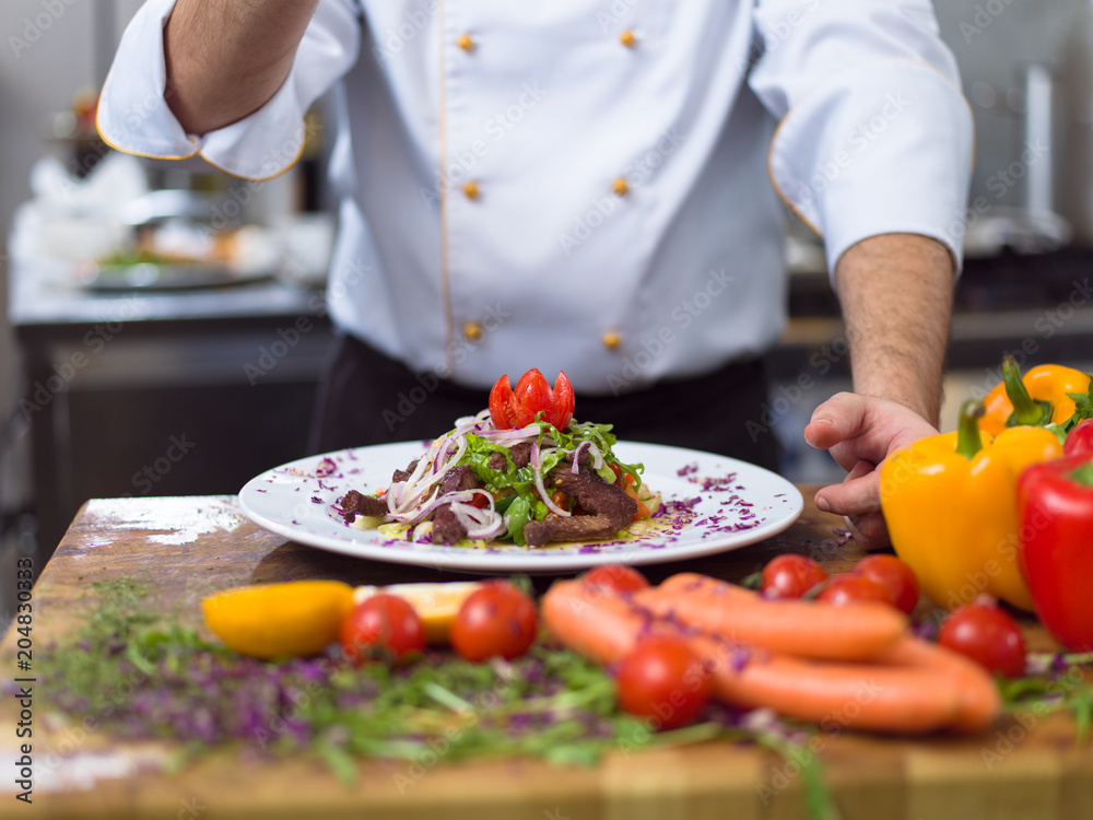 cook chef decorating garnishing prepared meal