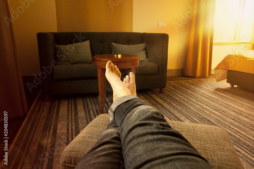 Man relaxing in living room - point of view perspective