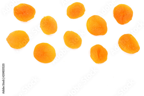 Dried apricots isolated on a white background with copy space for your text. Top view. Flat lay pattern