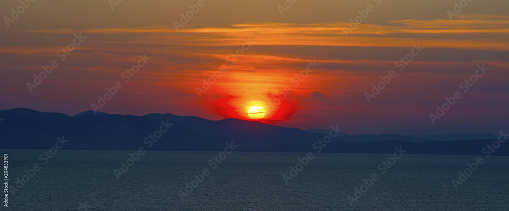 beautiful fiery sunset over the sea