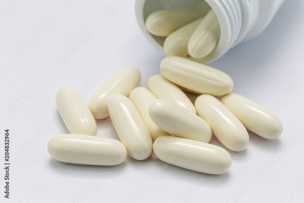 Pills and pills bottle on white background... Pills and pills bottle on white background...