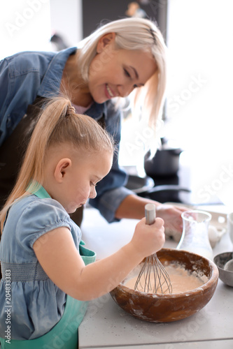 Little girl and her grandmo...