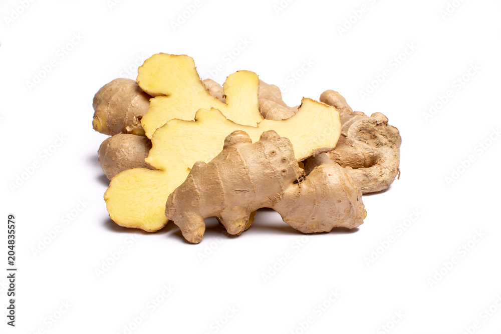 Fresh big ginger root close up copy space isolated on white background Fresh big ginger root close up copy space isolated on white background