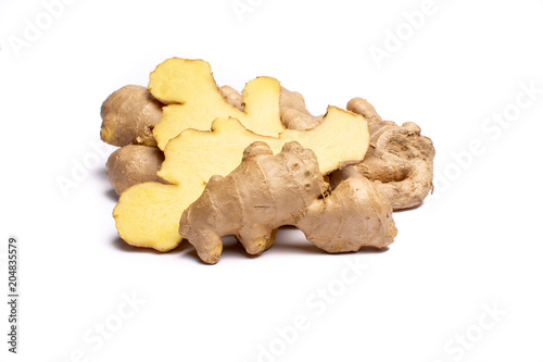 Fresh big ginger root close up copy space isolated on white background