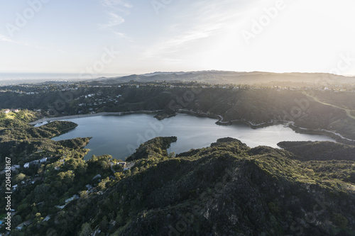 Aerial view of Stone Canyon Reservoir and the Santa Monica Mountains in Los Angeles, California.