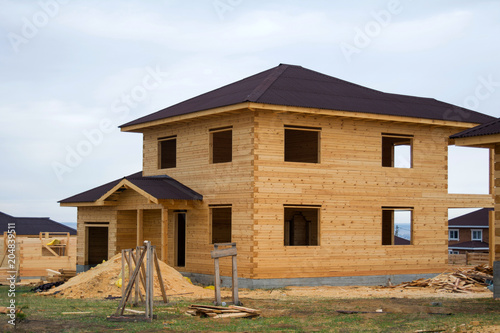 construction of wooden houses from a bar © fredialbert