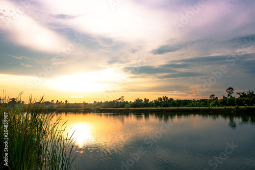 Landscape lake with sunset. © watchara