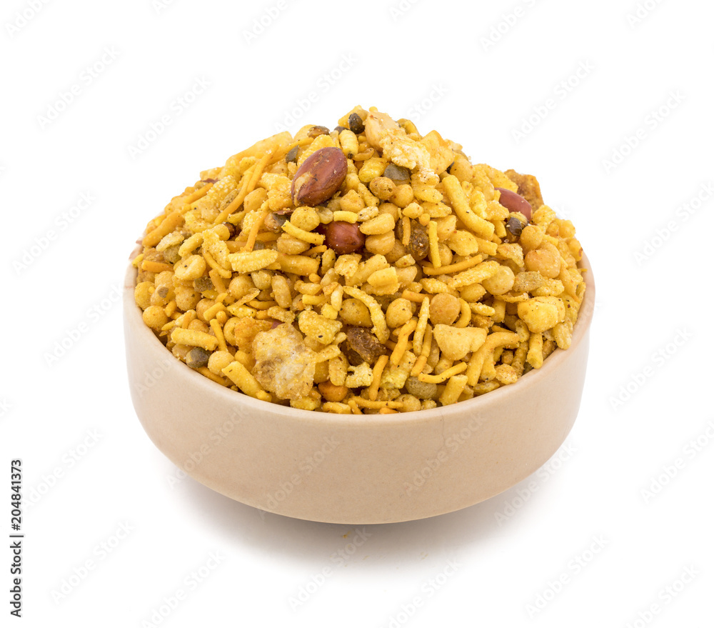 Indian Salty Snack Crunchy Mix Namkeen in bowl isolated on white Background Indian Salty Snack Crunchy Mix Namkeen in bowl isolated on white Background