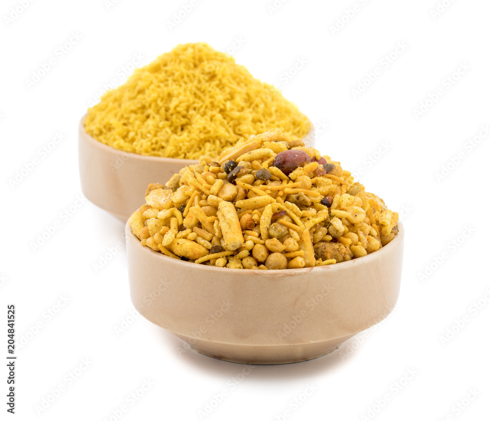Indian Salty Snack Crunchy Mix Namkeen in bowl isolated on white Background Indian Salty Snack Crunchy Mix Namkeen in bowl isolated on white Background