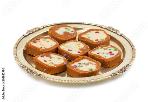Indian Sweet Colourful Mawa Peda Also know as pedha or peday Indian Popular Sweet Food Made up of Mawa, Milk and Sugar isolated on white background