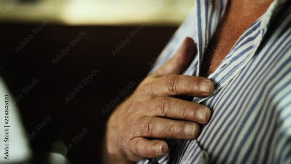 Man Singing the National Anthem. Hand on Heart. 