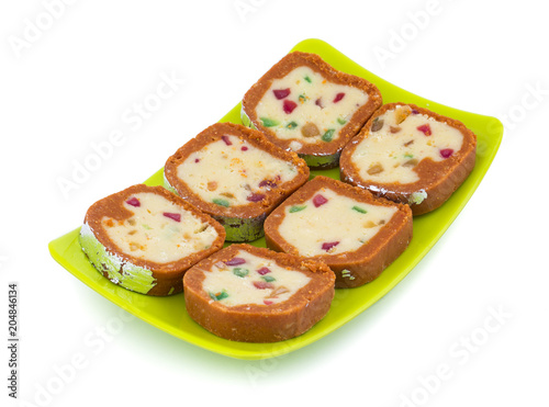 Indian Sweet Colourful Mawa Peda Also know as pedha or peday Indian Popular Sweet Food Made up of Mawa, Milk and Sugar isolated on white background photo