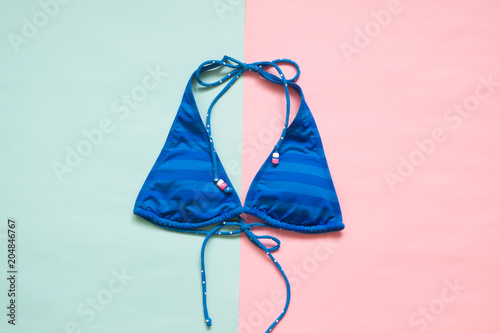 Blue stripe color bikini on pastel color background, Minimal summer concept