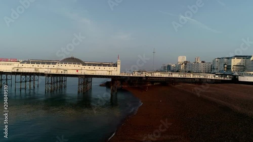 Wallpaper Mural Drone flies sideways and rises past Brighton Pier Torontodigital.ca