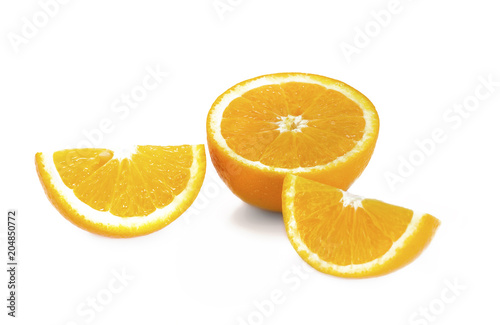 Sliced orange fruit segments isolated on white background