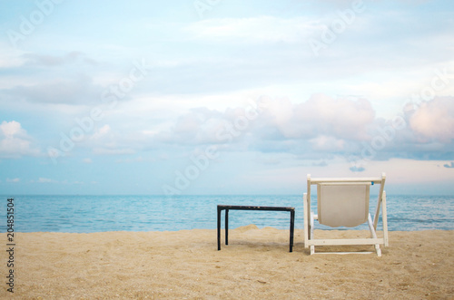Fototapeta Naklejka Na Ścianę i Meble -  Chair on sand beach.