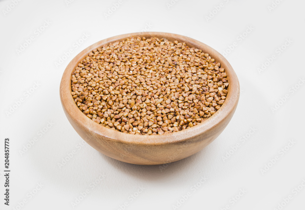 buckwheat in a plate on white background buckwheat in a plate on white background