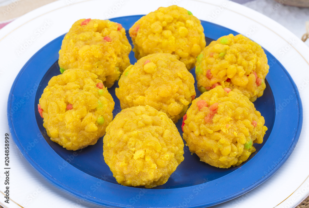 Laddu also know as laddoo, ladoo, laddo are ball-shaped sweets popular in the Indian festivals. Laddu are made of flour, minced dough and sugar with other ingredients Laddu also know as laddoo, ladoo, laddo are ball-shaped sweets popular in the Indian festivals. Laddu are made of flour, minced dough and sugar with other ingredients
