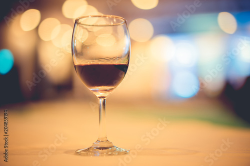 glass of expensive wine at a luxurious dinner.