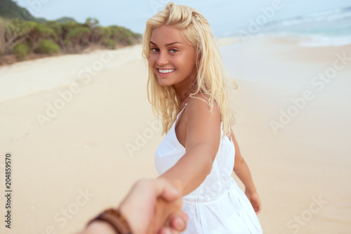 Smiling woman on the beach