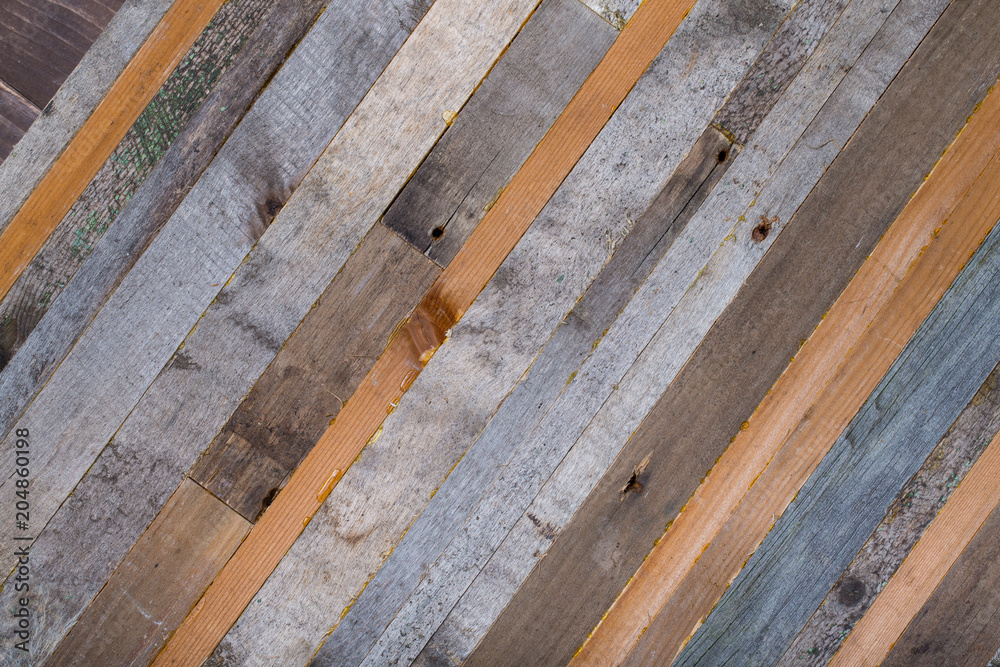 Wooden background from the ends of old boards Wooden background from the ends of old boards