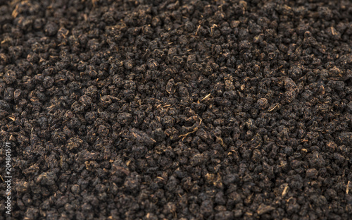 Aromatic Black Tea Loose or Dried Tea Leaves Background