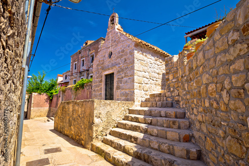 Old stone narrow street and chapel in Cavtat