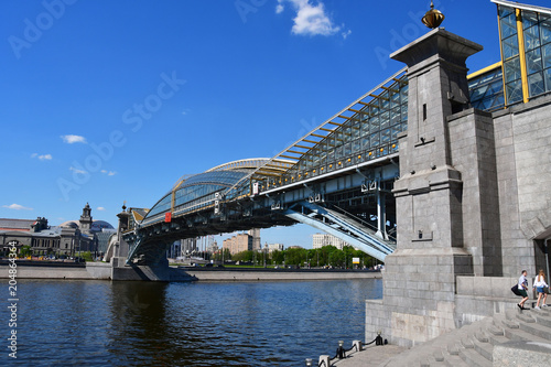 Moscow, Russia, the bridge of Bogdan Khmelnitsky (Kiev pedestrian bridge) across the Moscow river in the spring photo