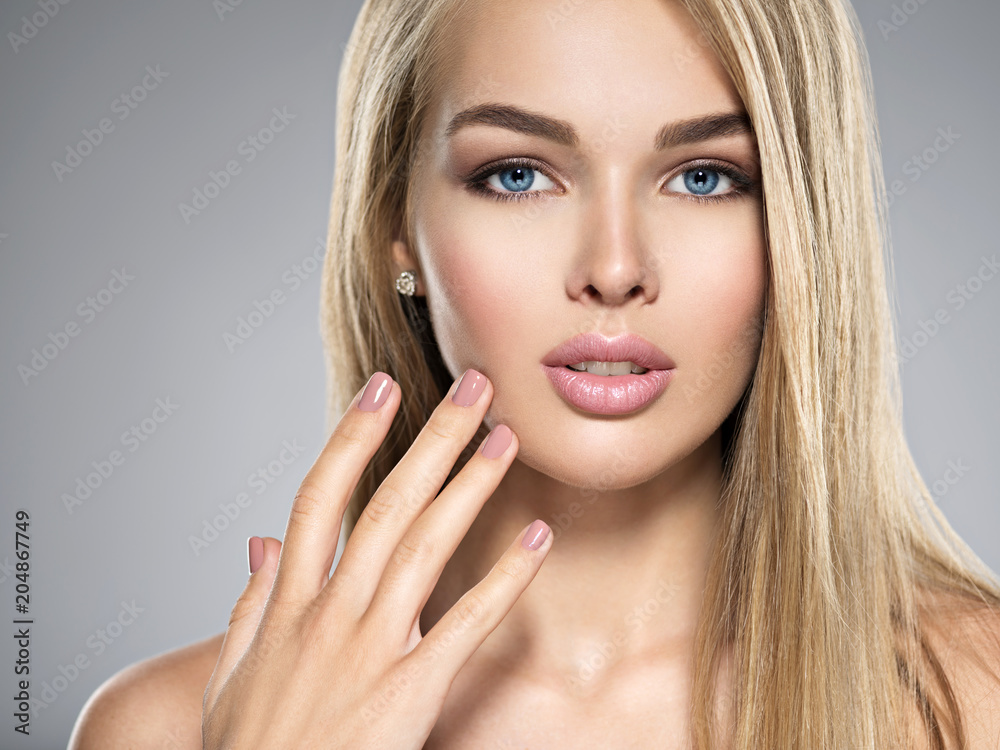 Fototapeta premium Young Woman with healthy skin of a face