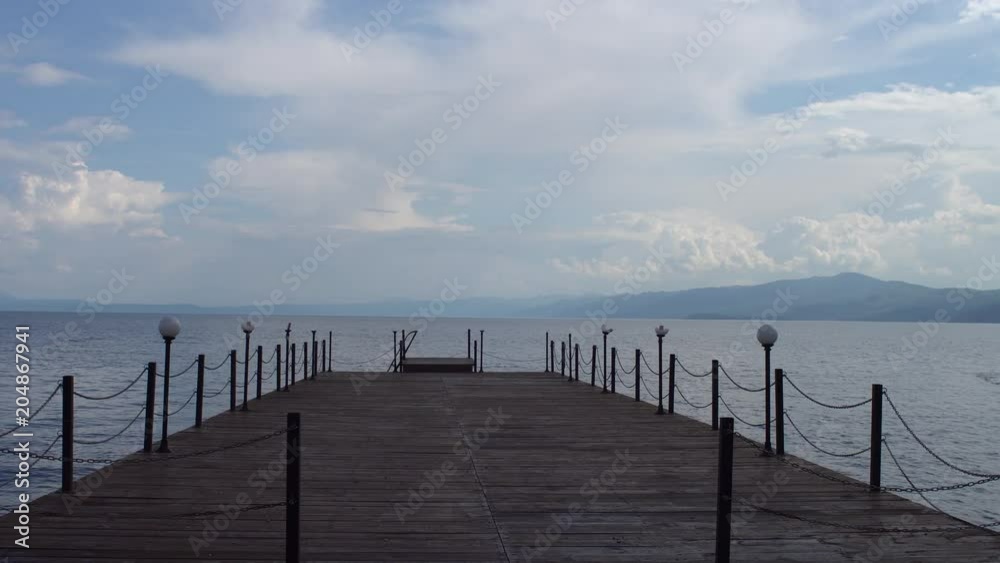 Old docks & boats at the summer day. Lake Ohrid Old docks & boats at the summer day. Lake Ohrid