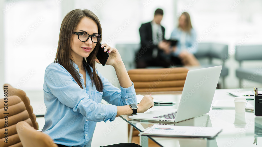 portrait of Manager Finance in the workplace in a modern office portrait of Manager Finance in the workplace in a modern office