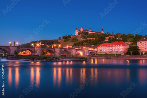 Beautiful stunning view of Wurzburg Old Main Bridge over the Main river and the Castle in the Old Town of Wurzburg, Bavaria, Germany - part of the Romantic Road.