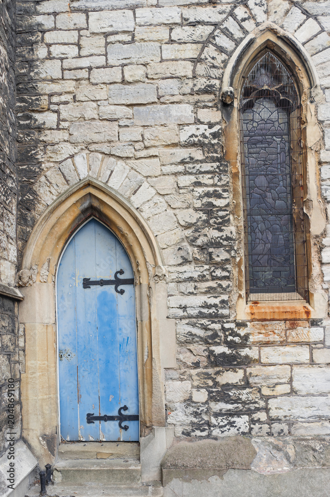 Characteristic old gothic door and window, London, England