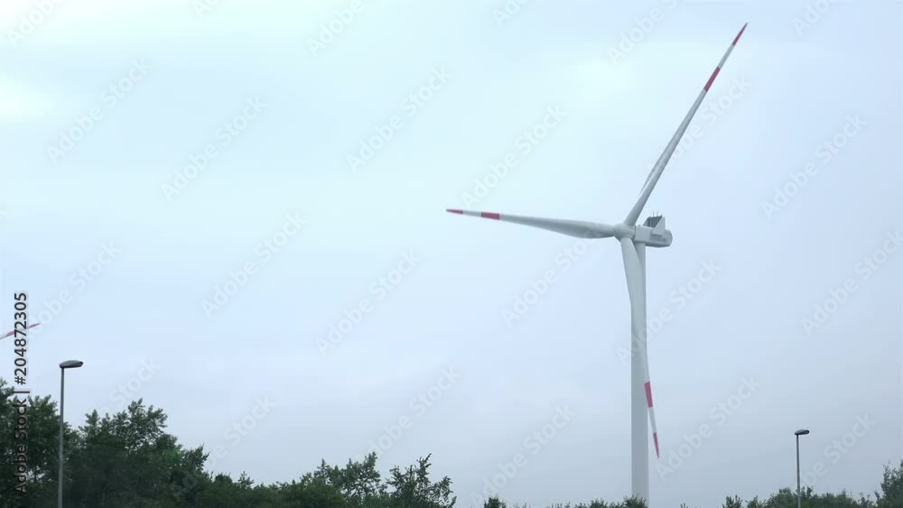 Modern Wind Turbine on Dense Fog. 4K Video Clip Modern Wind Turbine on Dense Fog. 4K Video Clip