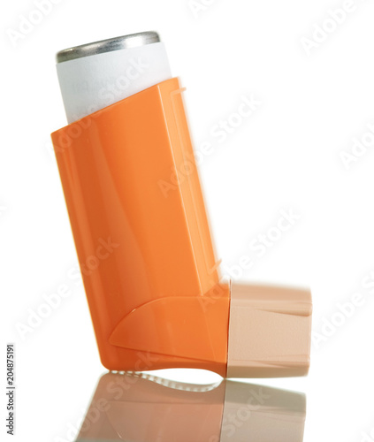 Small pocket inhaler depicted close-up isolated on white
